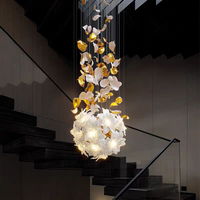 Fleur en céramique personnalisée de luxe longue lampe suspendue lustre en cuivre projet d'éclairage de salle à manger d'escalier de villa