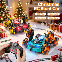 HOSHI 1612 Voiture RC à six roues pour cascades 360 ° Voiture de Noël transformable 2.4G avec lumières et pulvérisation d'eau, 20 minutes de jeu