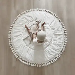 Esteras acolchadas para juegos de bebés, tapete redondo con decoración de borlas, esterilla de actividades para bebés de algodón certificado 100%