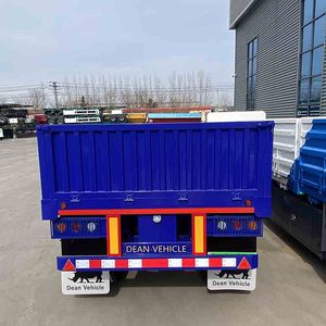 Semi-remorque à ridelles latérales - Semi-remorque fermée à 3 essieux avec ridelles latérales et fond plat, utilisée pour le transport de marchandises en vrac. À vendre. - Product Image 4