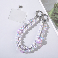 Dragonne de luxe portable et durable en alliage de zinc et plastique, ornée de perles de cristal, avec double chaîne, pour téléphone portable, porte-clés, étui de sac et dragonne de poignet