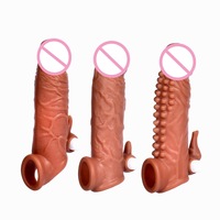 Kovida al por mayor: Funda vibradora de pene con puntos de maíz para retrasar la eyaculación, funda para pene con diseño de conejo, funda para pene con forma de huevo, funda para agrandar el pene.