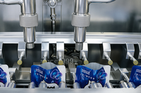 Machine de remplissage et de scellage automatique pour sachets préformés, doypacks et pochettes liquides (jus, boissons)