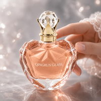 Flacon de parfum en verre vide en forme de cœur avec bouchon couronne facetté pour l'emballage de parfums