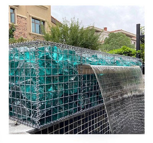 Des roches de verre cassé de paysage irrégulier sont employées pour des murs de gabion - Product Image 1