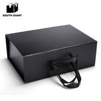 Boîte à valise rigide de luxe en papier texturé personnalisé avec poignée et fermeture magnétique pour cadeau