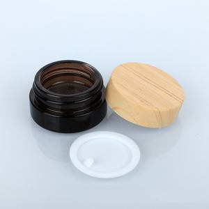 ขวดแก้วใสฝ้าทรงกลมขนาดเล็ก 5 กรัม 5 มล. สำหรับบรรจุภัณฑ์ครีมบำรุงรอบดวงตาสีเหลืองอำพัน พร้อมฝาพลาสติกไม้ไผ่ - Product Image 4