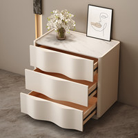 Commode minimaliste à panneaux ondulés en bois blanc crème pour salon et couloir