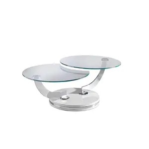 Coffee table with fixed tempered glass tops with curved chrome-plated stainless steel swivel arms.