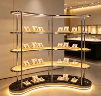 Kiosque d'exposition de bijoux d'extérieur artificiel avec vitrine en verre, éclairage LED, couleurs personnalisables et design durable pour la vente au détail et la décoration intérieure