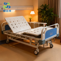 Lit médical manuel à trois manivelles pour soins à domicile et hôpitaux, pour patients en clinique, capacité de rotation de 250 kg, construction en acier