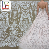 Nouvelle Arrivée Tissu en Dentelle Française Tissu Brodé de Paillettes Tissu en Dentelle Guipure Tissu en Dentelle Cordonnée Tissu en Maille pour Robes de Mariée Blanches