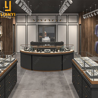 Comptoirs de magasin de détail modernes en bois et verre au design épuré pour l'affichage de bijoux avec options personnalisées