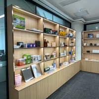 Comptoir d'accueil commercial avec vitrine haute intégrée, armoire de rangement LED, armoire murale de réception de bureau personnalisée
