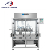 Machine de remplissage automatique de liquides à performance stable, équipement de remplissage de bouteilles en acier inoxydable à commande servo pour liquides fluides