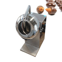 Machine à fabriquer des flocons de chocolat aux cacahuètes en parfait état d'usine avec un revêtement de sucre et de noix