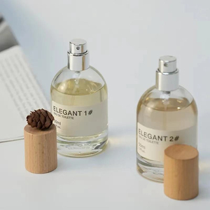 Venta al por mayor: Botella de vidrio cilíndrica transparente de 30ml, 50ml, 100ml con pulverizador, tapa de madera de lujo para perfume, vacía, para aceites esenciales, acabado mate. - Product Image 3