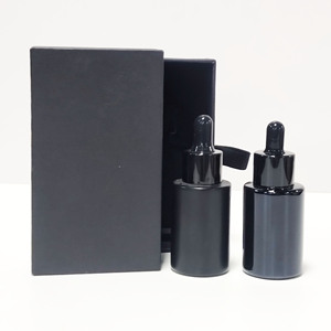 ขวดแก้วใส่เครื่องสำอางสีดำขนาด 30 กรัม แบบกำหนดเองจากโรงงาน สำหรับบรรจุเซรั่มน้ำมันบำรุงเส้นผม ขวดแก้วแบบไหล่เรียบสีด้านพร้อมหัวหยด - Product Image 1