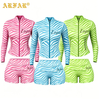 Ensemble de survêtement deux pièces pour femme avec logo personnalisé, imprimé zèbre, veste de yoga courte sans couture, short taille haute à séchage rapide, ensemble deux pièces pour femme
