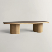 Table basse ovale avec plateau en marbre, bord en bois, base en piédestal cannelé pour salon