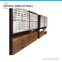 Vitrina de Exhibición Óptica LED Personalizada con Estantes Iluminados para Gafas y Almacenamiento en Cajones de Madera para Tiendas de Óptica