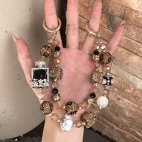 Chaîne de téléphone en perles de cristal exquises à prix unitaire de 3,9 $ – Vente en gros, porte-clés brillant glamour, chaîne de sac, chaîne de téléphone portable de luxe à faire soi-même