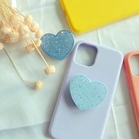 Vente chaude support universel de poignée de doigt de téléphone nouveaux accessoires en forme de coeur de puissance de paillettes en matériau PC Durable