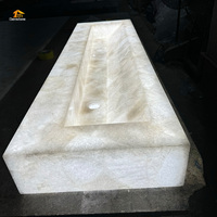 Vasque de salle de bain de luxe translucide rétroéclairée en pierre de cristal blanche pour villa et hôtel