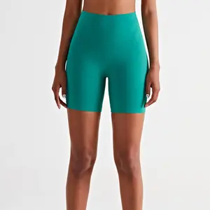 מכירה חמה מכנסי יוגה ספורט חדשים לנשים מכנסיים קצרים אפרסק עדינים ללא קו T עירום מכנסי ירך גבוהים