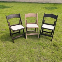 Chaise pliante en résine de haute qualité pour événements extérieurs, fêtes, mariages, banquets et réceptions, avec finition imitation bois, vente en gros