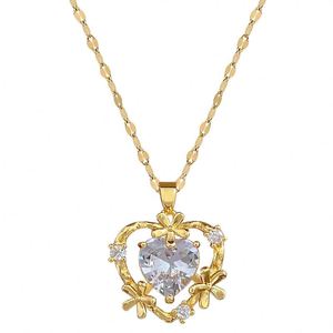 Parure de bijoux de luxe léger en acier inoxydable plaqué or 18 carats avec micro-incrustations de zircone, comprenant un collier et des boucles d'oreilles à pendentifs Cœur et Fleur - Product Image 5