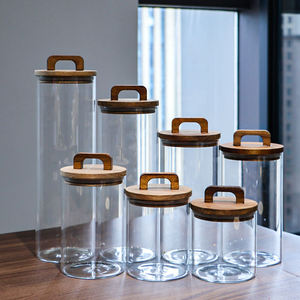 Bocaux et bouteilles de rangement cylindriques en verre borosilicate transparent avec couvercles en bois – Design multifonctionnel et écologique pour la cuisine - Product Image 5