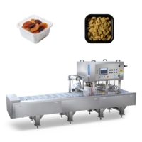 Machine d'emballage sous atmosphère modifiée automatique continue GFY-480M-Q pour fruits conservés et raisins secs