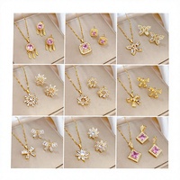 KISSWIFE Parure de Bijoux en Acier Inoxydable Plaqué Or 18 Carats avec Chaîne, Pendentif Zircon et Cristaux, Collier et Boucles d'Oreilles pour Femme, Idée Cadeau