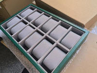 Plateau de présentation de montres en cuir vert émeraude haut de gamme à 12 emplacements, intérieur en velours gris de qualité supérieure, vitrine professionnelle pour montres