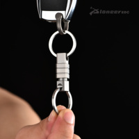 Mini porte-clés en alliage de titane à boucle rotative universelle haut de gamme pour voiture Camping randonnée visites en plein air