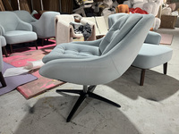 Fauteuil pivotant capitonné de style mid-century moderne, chaise en velours rembourrée avec base en métal noir