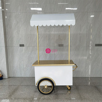 Yicheng Offre Spéciale personnalisé chariot à bonbons chariot de vente chariot d'affichage des aliments chariot avec roues pour les entreprises