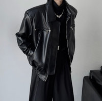 Veste bomber unisexe décontractée d'hiver surdimensionnée en similicuir PU noir de haute qualité, personnalisable en gros, avec plusieurs fermetures éclair et col à revers