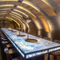 Pierre lumineuse de luxe, prix avantageux pour table à manger en granit bleu solide et bureau de réception en quartz Pandora, design translucide