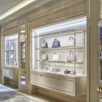 Vitrine à bijoux haut de gamme GZowin, cadre en acier inoxydable, verre haute transparence, éclairage LED, design écologique, durable