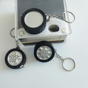 พวงกุญแจตลับเมตรรูปทรงยางรถยนต์ 1 เมตร แบบพกพา ใช้ได้ทั้งหน่วยเมตริกและอิมพีเรียล ผลิตจากโลหะผสมสังกะสีและพลาสติก พิมพ์ลายดิจิตอล ของขวัญส่งเสริมการขาย - Product Image 1