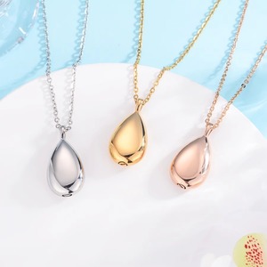 Pendentif urne commémorative élégant en forme de goutte d'eau, plaqué or 18 carats, en acier inoxydable, pour cendres humaines et animales de compagnie - Product Image 3