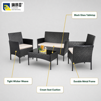 Ensemble de patio 4 pièces en rotin PE noir avec coussins beiges et table en verre