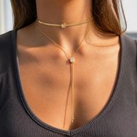 Collier Bolo en Chaîne à Pampilles en Zircon en Forme de Y Simple Plaqué Or 18K en Acier Inoxydable Vintage Étanche de Designer Maiou