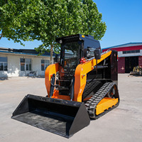 Mini Compact Hydraulic Rubber Tire dengan Kabin Tertutup Skid Steer Loader untuk Pekerjaan Lanskap Pertanian