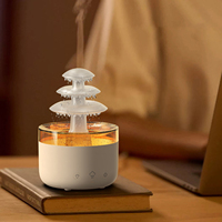 Humidificateur électrique moderne à trois couches en forme de nuage de pluie avec diffuseur d'aromathérapie LED 7 couleurs