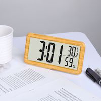 Réveil numérique LCD avec affichage de la température, cadre en bois, fonction snooze, design moderne pour bureau, salon, table de chevet