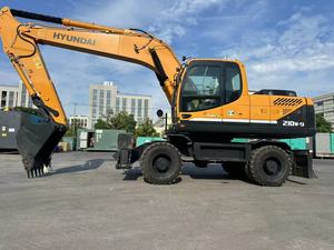 รถขุดล้อยางมือสอง HYUNDAI 210W-9 ขนาด 20 ตัน สำหรับปรับระดับพื้นที่หญ้า  พร้อมเครื่องยนต์แข็งแกร่ง  รุ่น Multi-Terrain Dominator - Product Image 2