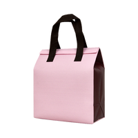 Sac isotherme bicolore bleu-jaune en non-tissé pour le stockage des fruits de mer avec un design contrasté et un intérieur spacieux